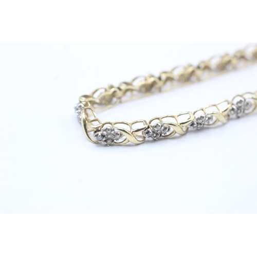 74 - 9ct gold diamond link bracelet (5.8g)