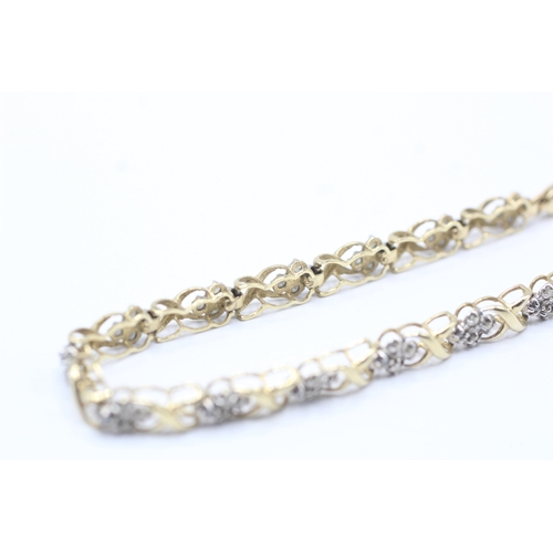 74 - 9ct gold diamond link bracelet (5.8g)