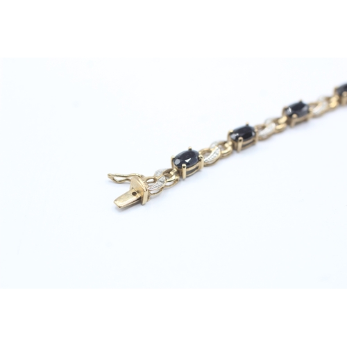 82 - 9ct gold sapphire and diamond link bracelet (8.1g)