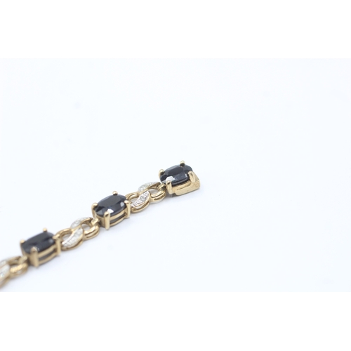 82 - 9ct gold sapphire and diamond link bracelet (8.1g)