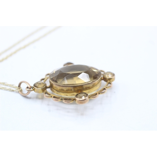 94 - 9ct gold citrine set pendant on chain (7.3g)