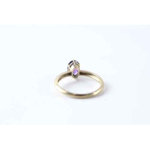 96 - 9ct gold oval cut amethyst solitaire dress ring (1.7g) Size N