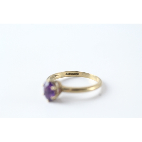 96 - 9ct gold oval cut amethyst solitaire dress ring (1.7g) Size N