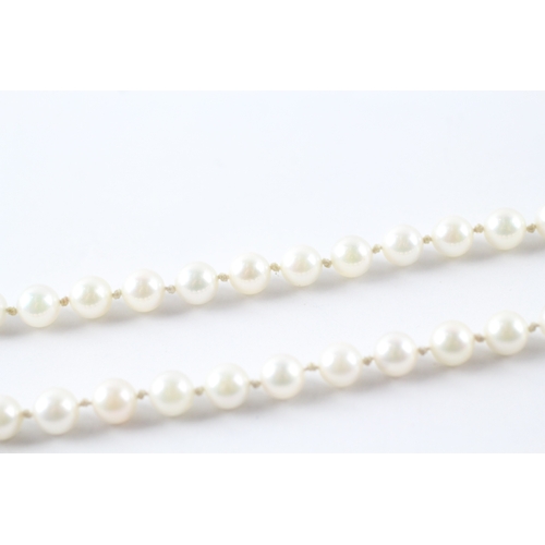 109 - 9ct gold diamond set clasp individually knotted cultured pearl necklace (19g)