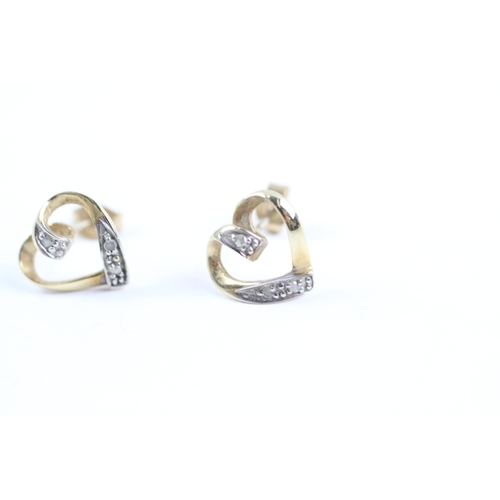 167 - 9ct gold diamond heart stud earrings (1g)