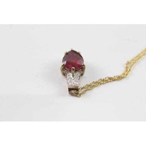 174 - 9ct gold pear cut ruby and diamond pendant w/ 9ct gold chain (2.2g)