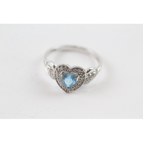 191 - 9ct gold blue topaz & diamond heart shape dress ring (2g) Size N 1/2