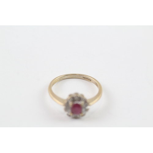 195 - 9ct gold ruby and diamond halo ring (1.8g) Size J