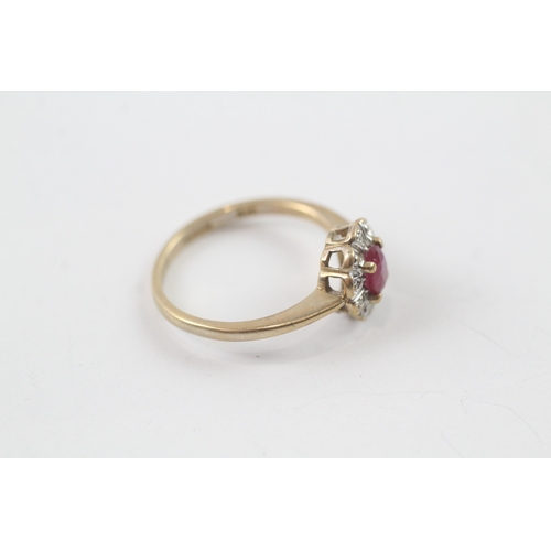 195 - 9ct gold ruby and diamond halo ring (1.8g) Size J