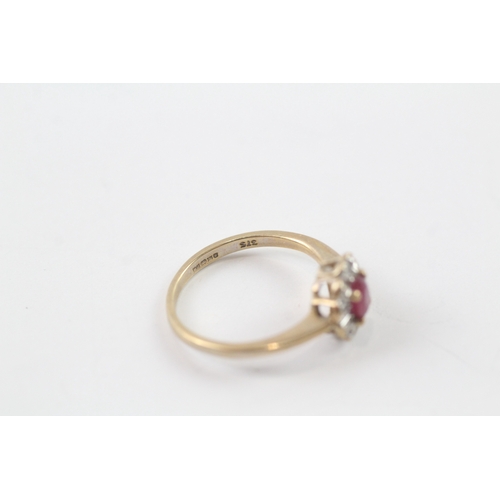 195 - 9ct gold ruby and diamond halo ring (1.8g) Size J