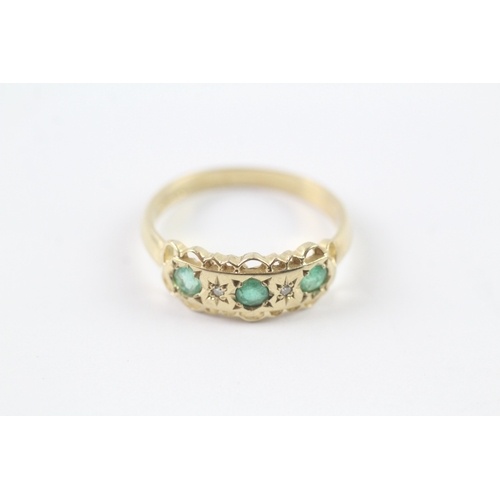 208 - 9ct gold emerald and diamond star setting ring (2.7g) Size Q