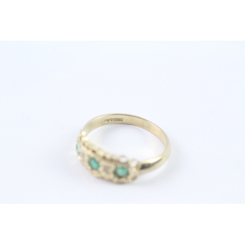 208 - 9ct gold emerald and diamond star setting ring (2.7g) Size Q