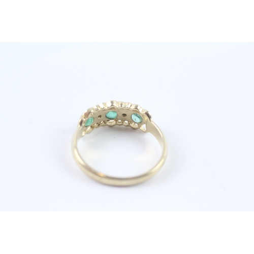 208 - 9ct gold emerald and diamond star setting ring (2.7g) Size Q