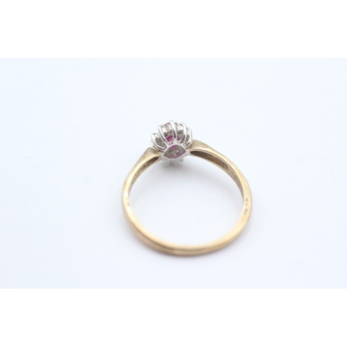 215 - 9ct gold red gemstone and diamond halo ring (1.9g) Size P