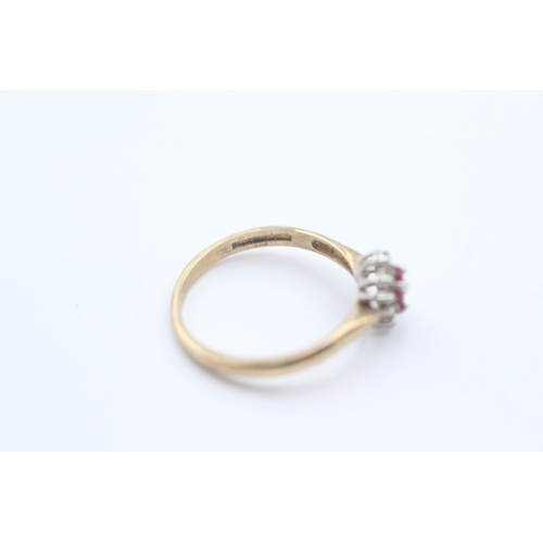 215 - 9ct gold red gemstone and diamond halo ring (1.9g) Size P