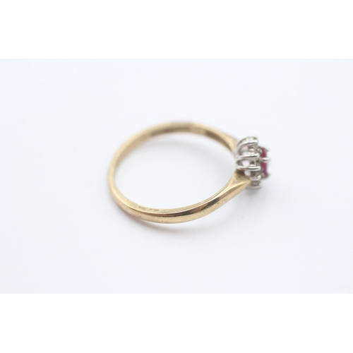 215 - 9ct gold red gemstone and diamond halo ring (1.9g) Size P