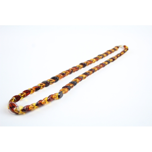 219 - 9ct gold vari-hue amber necklace (13.9g)