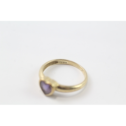 229 - 9ct gold amethyst love heart ring (1.8g) Size L 1/2