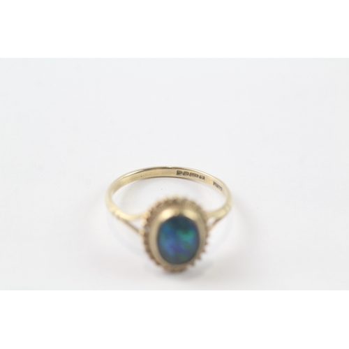 230 - 9ct gold opal triplet ring (1.9g) Size O