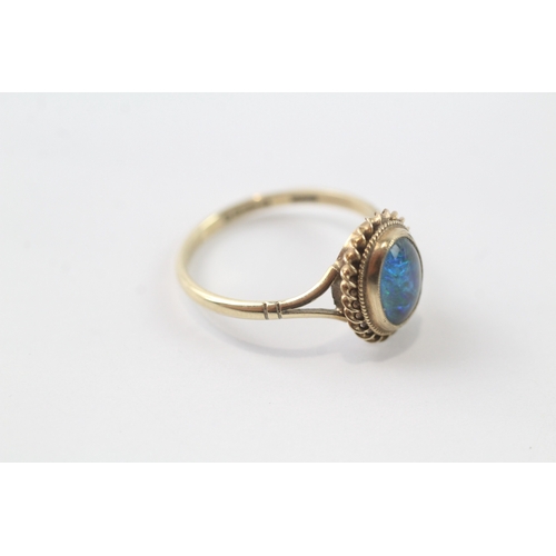 230 - 9ct gold opal triplet ring (1.9g) Size O