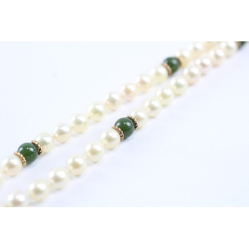 233 - 9ct gold cultured pearl & green gemstone necklace (23.8g)