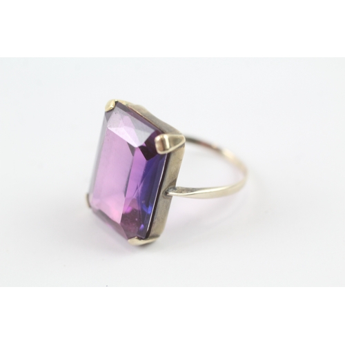 235 - 9ct Gold vintage purple gemstone cocktail ring (5.5g) Size N