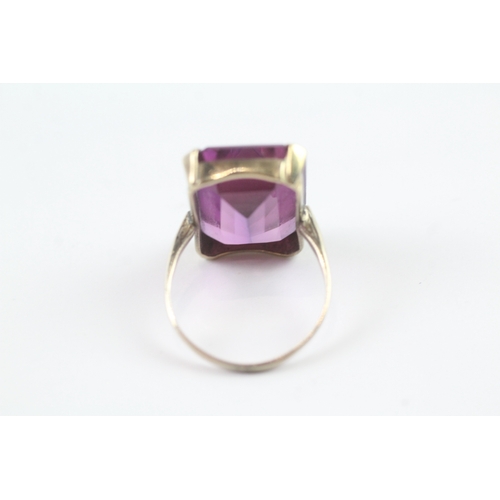 235 - 9ct Gold vintage purple gemstone cocktail ring (5.5g) Size N