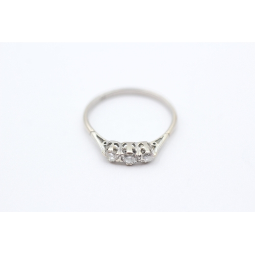 238 - 18ct gold three stone diamond ring (1.8g) Size R