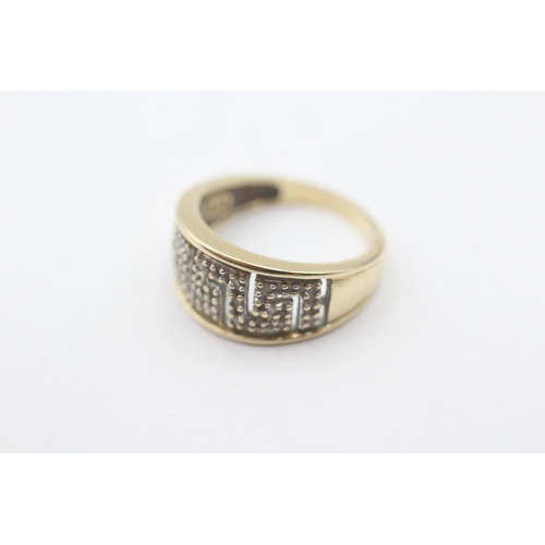 242 - 9ct gold diamond dress ring (3.1g) Size K