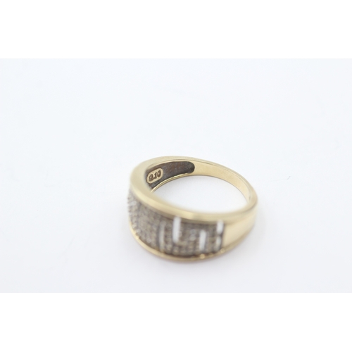 242 - 9ct gold diamond dress ring (3.1g) Size K