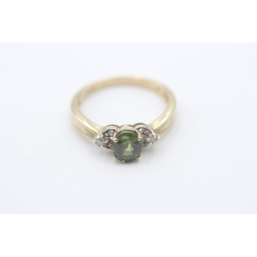 245 - 9ct gold green gemstone & diamond dress ring (2.8g) Size N