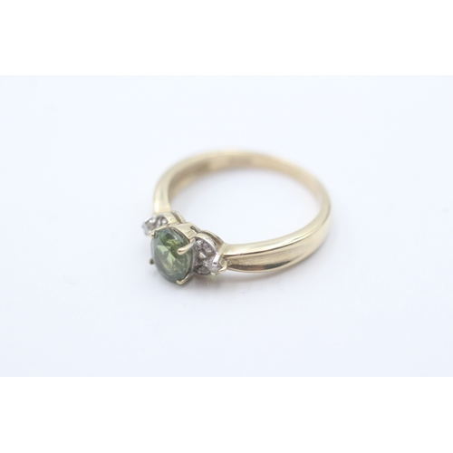 245 - 9ct gold green gemstone & diamond dress ring (2.8g) Size N