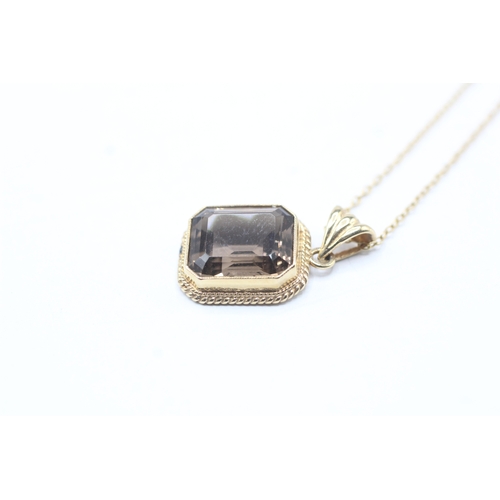 42 - 9ct gold smokey quartz necklace (3.3g)