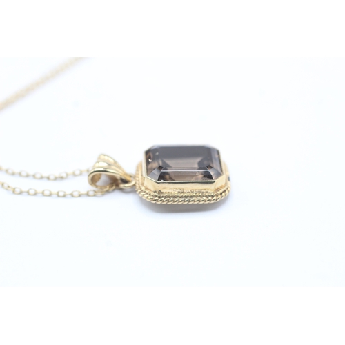 42 - 9ct gold smokey quartz necklace (3.3g)