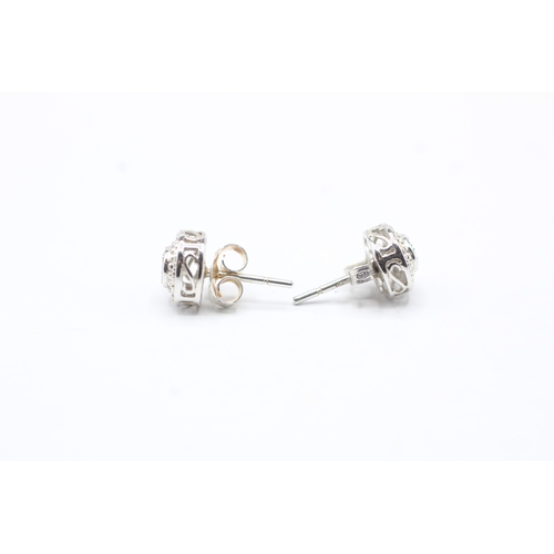 49 - 9ct gold diamond stud earrings (2g)