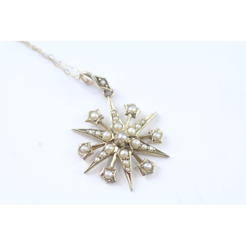 61 - 9ct gold antique seed pearl starburst pendant w/ 9ct gold chain (2.7g)