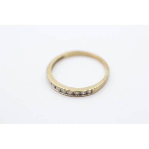 77 - 9ct gold diamond half eternity ring (1.4g) Size O 1/2