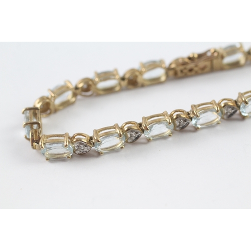 82 - 9ct gold aquamarine and diamond tennis bracelet (11g)