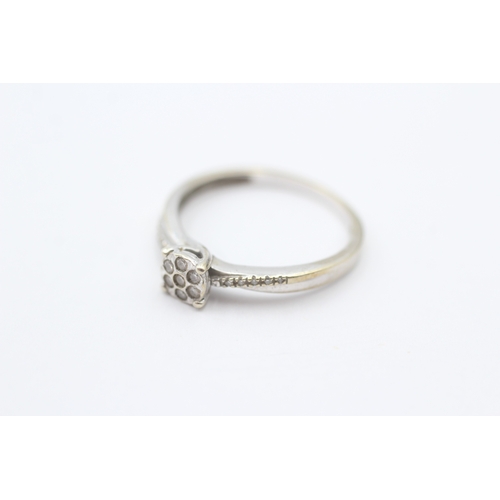 83 - 9ct gold diamond cluster ring (1.7g) Size N