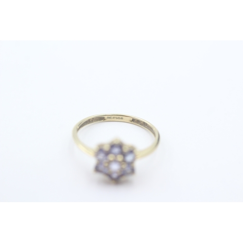 87 - 9ct gold tanzanite cluster ring (1.5g) Size M