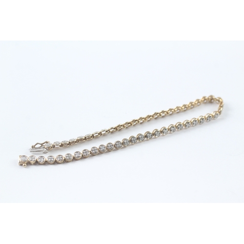 121 - 9ct gold diamond tennis bracelet (5.6g)