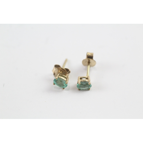 123 - 9ct gold oval cut emerald stud earrings (0.7g)