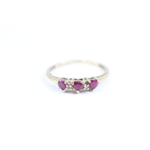 124 - 9ct gold heart cut ruby and diamond dress ring (1.5g) Size N 1/2