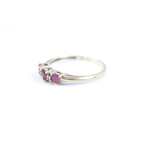 124 - 9ct gold heart cut ruby and diamond dress ring (1.5g) Size N 1/2