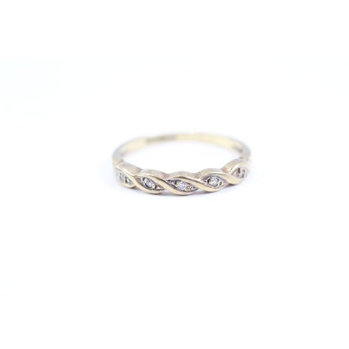 133 - 9ct gold diamond five stone twist dress ring (1.5g) Size L