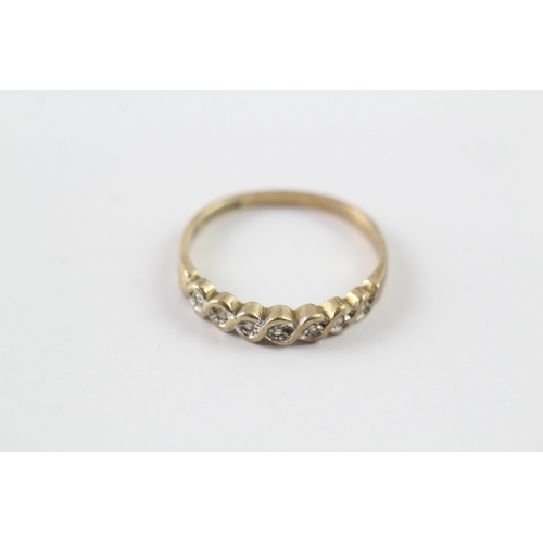 135 - 9ct gold diamond half eternity ring (1.5g) Size O