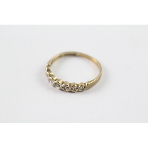 135 - 9ct gold diamond half eternity ring (1.5g) Size O