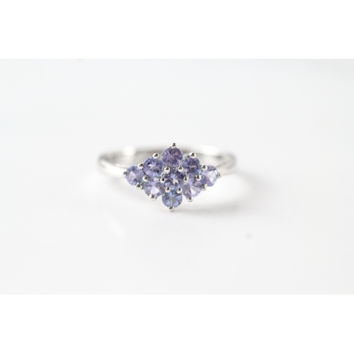 143 - 9ct white gold tanzanite cluster dress ring (1.8g) Size O 1/2