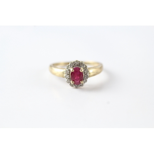 144 - 9ct gold ruby and diamond halo dress ring (1.9g) Size L 1/2