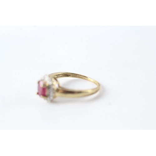 144 - 9ct gold ruby and diamond halo dress ring (1.9g) Size L 1/2